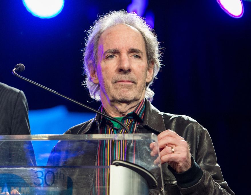 FILE - In this Jan. 24, 2015 file photo, Harry Shearer appears at the 30th annual TEC Awards during the 2015 National Association of Music Merchants (NAMM) show in Anaheim, Calif. An escalating contract dispute suggests that Harry Shearer may exit "The Simpsons," where he has voiced several of its characters since the Fox cartoon series debuted in 1989. In Twitter posts on Thursday, May 14, 2015, Shearer said re-upping with the series would have denied him "what we've always had: the freedom to do other work." In a tweet hours later, "Simpsons" executive producer Al Jean resolved to “recast if Harry does not return.” (Photo by Paul A. Hebert/Invision/AP, File)
