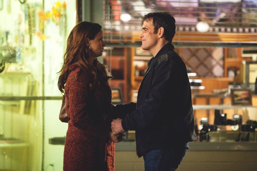 This photo provided by Fox shows, Matt Dillon, right, as Ethan, and Juliette Lewis, as Beverly, finalizing their plans in the "Don't Discuss Your Life Before" episode of "Wayward Pines," airing Thursday, May 21, 2015 (9:00-10:00 p.m. ET/PT) on Fox. The series premiering this week, stars Dillon, Terrence Howard, Melissa Leo and Lewis. M. Night Shymalan is the executive producer. (Liane Hentscher/Fox via AP)
