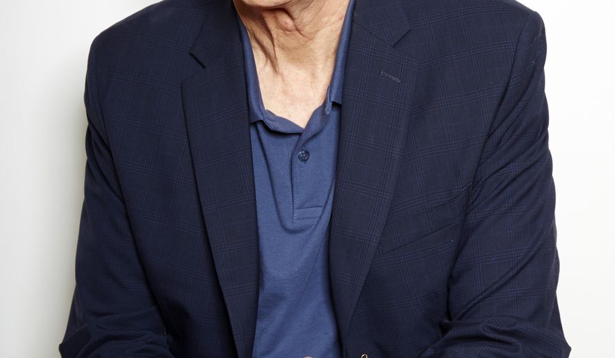 Grammy Award winning singer-songwriter James Taylor poses for a portrait in New York on Wednesday, May 13, 2015. Taylor is releasing a new album "Before This World" featuring a tribute to the Boston Red Sox called "Angels at Fenway." (Photo by Dan Hallman/Invision/AP)