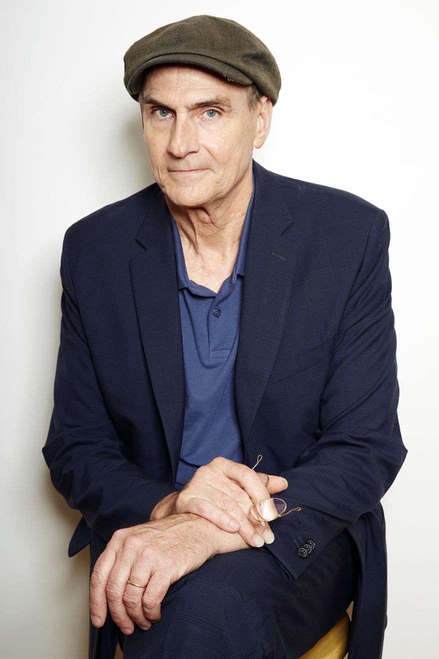 Grammy Award winning singer-songwriter James Taylor poses for a portrait in New York on Wednesday, May 13, 2015. Taylor is releasing a new album "Before This World" featuring a tribute to the Boston Red Sox called "Angels at Fenway." (Photo by Dan Hallman/Invision/AP)