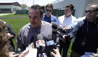 San Francisco 49ers head coach Jim Tomsula speaks to reporters at a football rookie minicamp at an NFL facility in Santa Clara, Calif., Friday, May 15, 2015. (AP Photo/Jeff Chiu)
