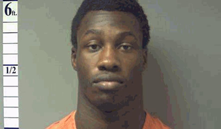 FILE - In this Oct 10, 2013 file booking photo released by St. Charles County Department of Corrections show Michael L. Johnson, who faces felony HIV exposure charges. Jurors recommended a 30-year prison sentence Friday, May 15, 2015, for the 23-year-old man convicted of infecting another man with HIV and endangering four others with the disease while attending college in Missouri (St. Charles County Department of Corrections via AP)