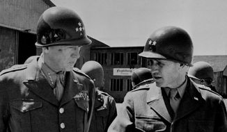 Gen. George S. Patton Jr., left, commander of the U.S. 15th Army, and his chief of staff, Maj. Gen. H.R. Gay, right, are pictured in an undated photo. (AP Photo) ** FILE **