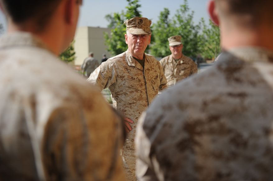 Marines pose with General James Mattis, Commanding General, CENTCOM, at the U.S. Embassy in Kabul, Afghanistan, on Sunday, May 8, 2011.