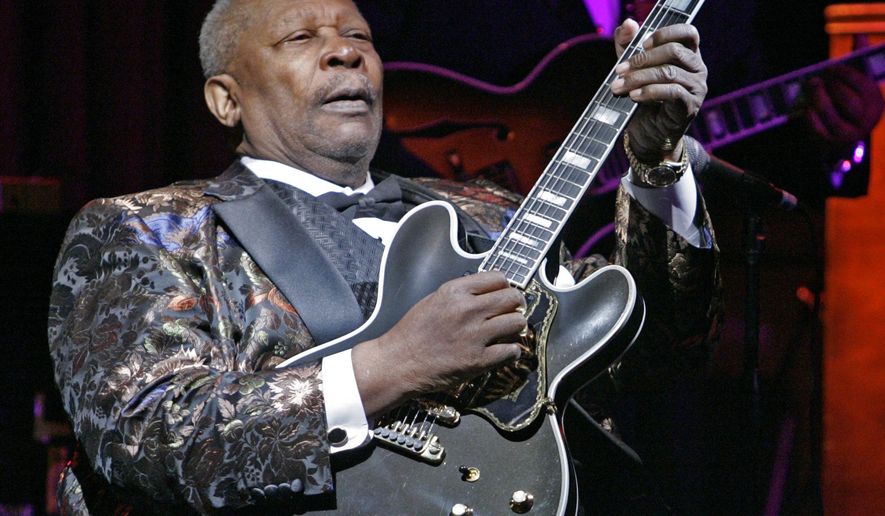 FILE - In this April 18, 2006 file photo, B.B. King plays during his 10,000th career performance in an appearance at his club in New York. King died Thursday, May 14, 2015, peacefully in his sleep at his Las Vegas home at age 89, his lawyer said. (AP Photo/Richard Drew, File)
