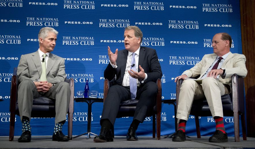 From left, United Airlines Chairman, President and Chief Executive Officer Jeff Smisek, American Airlines Group Chairman and Chief Executive Officer W. Douglas Parker, and Delta Air Lines Chief Executive Officer Richard Anderson, participate in a panel discussion about what they call unfair international competition, Friday, May 15, 2015, at the National Press Club in Washington. (AP Photo/Manuel Balce Ceneta)