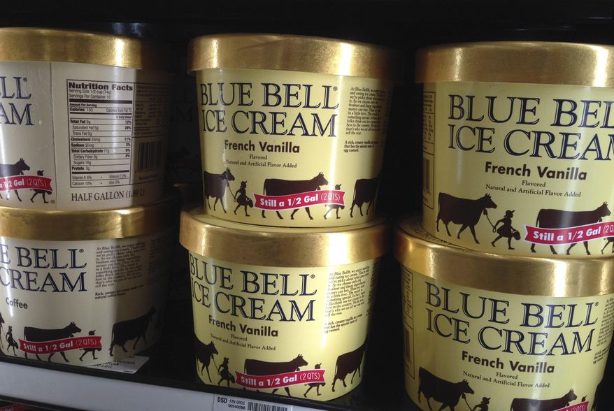 FILE - In this April 10, 2015, file photo, Blue Bell ice cream rests on a grocery store shelf in Lawrence, Kan. Blue Bell Creameries will lay off more than a third of its workforce following a series of listeria illnesses linked to its ice cream that prompted a nationwide recall, the Texas company announced Friday, May 15, 12015. (AP Photo/Orlin Wagner, File)