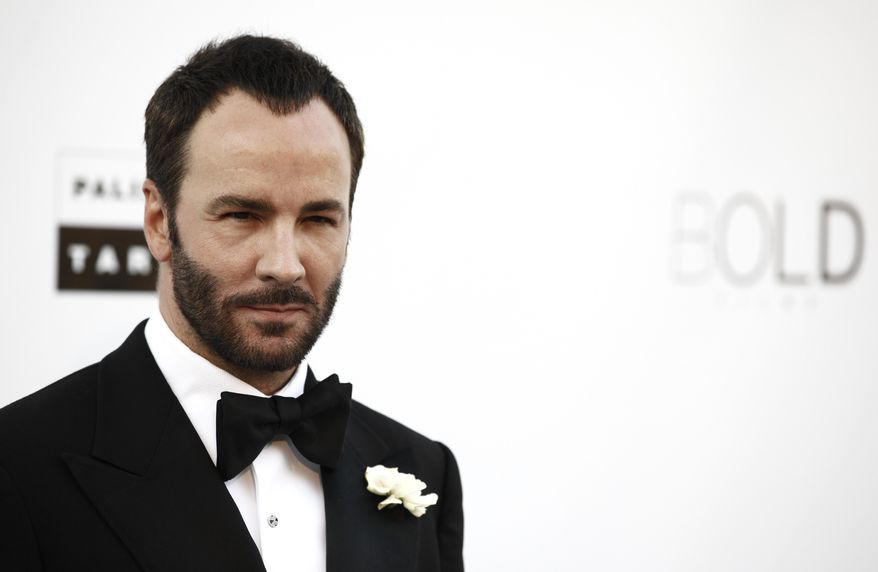 FILE- In this May 20, 2010 file photo, designer Tom Ford arrives for the amfAR Cinema Against AIDS benefit at the Hotel du Cap-Eden-Roc, during the 63rd Cannes international film festival, in Cap d'Antibes, southern France. Tom Ford’s second film has been acquired by Focus Features in the biggest sale yet at the 68th international Cannes film festival.(AP Photo/Matt Sayles, File)