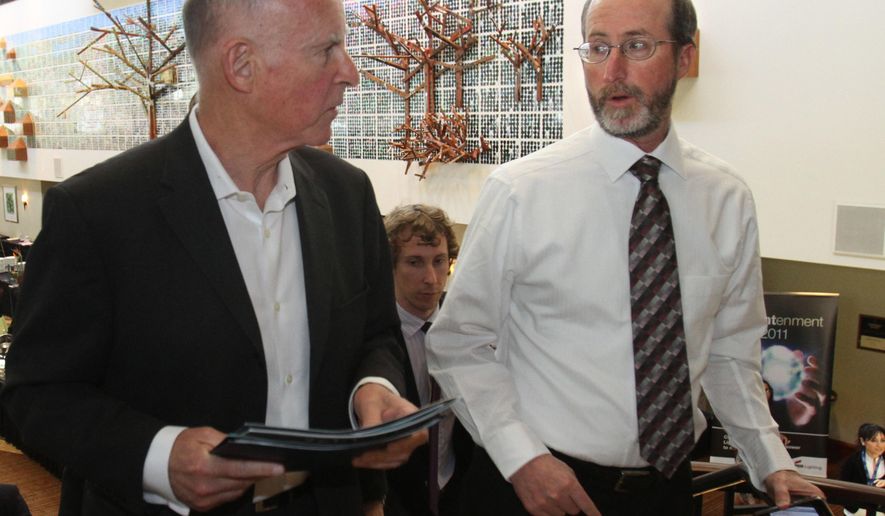 FILE -- In this April 5, 2011 file photo Gov. Jerry Brown, left, talks with adviser Steve Glazer, in Sacramento, Calif. Glazer, who is currently the Mayor of Orinda, is running in a special election Tuesday, May 19, 2015 for the 7th Senate District, against fellow Democrat, Assemblywoman Susan Bonilla of Concord.(AP Photo/Rich Pedroncelli, file)