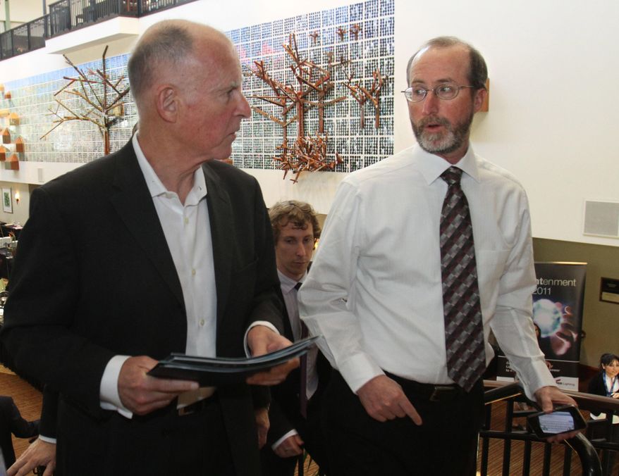 FILE -- In this April 5, 2011 file photo Gov. Jerry Brown, left, talks with adviser Steve Glazer, in Sacramento, Calif. Glazer, who is currently the Mayor of Orinda, is running in a special election Tuesday, May 19, 2015 for the 7th Senate District, against fellow Democrat, Assemblywoman Susan Bonilla of Concord.(AP Photo/Rich Pedroncelli, file)