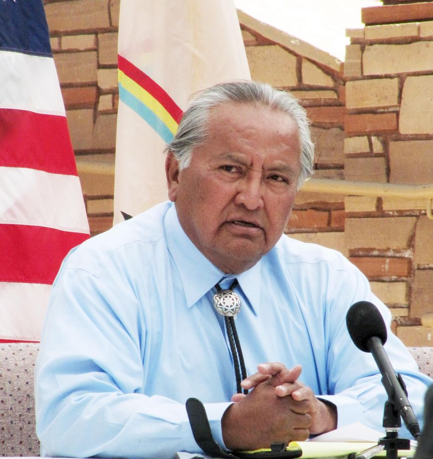 FILE - In this May 28, 2010 file photo, Navajo Supreme Court Justice Herb Yazzie announces a ruling in Window Rock, Ariz. Yazzie has retired, ending a decades-long legal career in which he played a key role in upholding a requirement that candidates for tribal president fluently speak the Navajo language. (AP Photo/Felicia Fonseca, File)