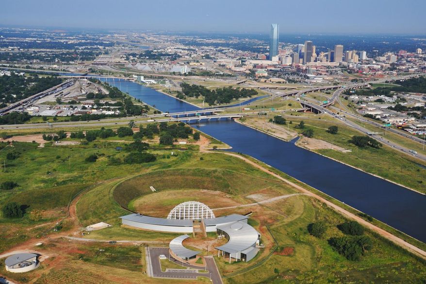 FILE - In this undated file photo provided by The American Indian Cultural Center and Museum, the uncompleted center, bottom, is pictured with the city of Oklahoma City in the background. Oklahoma City could get the final boost of funding it needs to complete a vision that state policymakers first had two decades ago if the $25 million bond plan is approved by the Oklahoma Legislature. (AP Photo/ The American Indian Cultural Center and Museum, Kimberly Rodriguez, File)