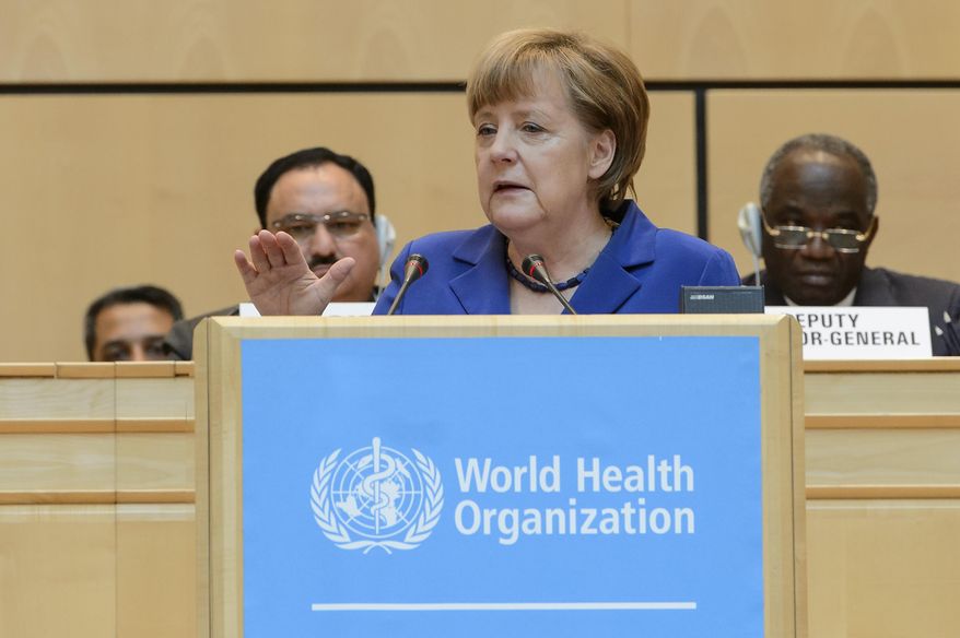 German Chancellor Angela Merkel, speaks during the opening of the 68th World Health Assembly at the European headquarters of the United Nations in Geneva, Switzerland, Monday, May 18, 2015. (Jean-Christophe Bott/Keystone via AP)