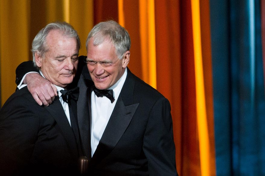 FILE - In this March 26, 2011 file photo, Bill Murray, left, and David Letterman appear at the "The Comedy Awards" presented by Comedy Central in New York. After 33 years in late night and 22 years hosting CBS' "Late Show," Letterman will retire on May 20. (AP Photo/Charles Sykes, File)