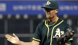 Oakland Athletics relief pitcher Tyler Clippard reacts after striking out Houston Astros&#39; Jason Castro in the ninth inning to end a baseball game Monday, May 18, 2018, in Houston. The Athletics won 2-1. (AP Photo/David J. Phillip)