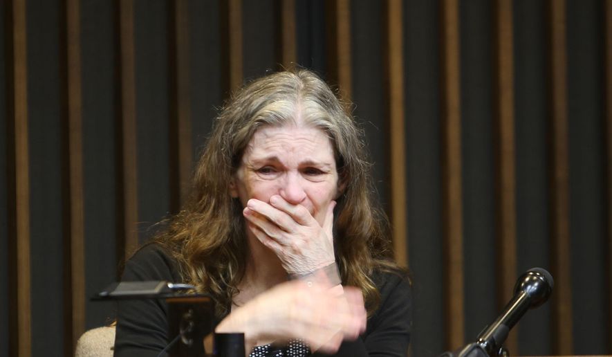 Donna Scrivo, the St. Clair Shores mother on trial in Macomb County for killing and dismembering her adult son, Ramsey Scrivo in January 2014 in his St. Clair Shores condo, takes the stand before Judge Richard Caretti at the Macomb County Circuit Court in Mount Clemens, Mich., Monday, May 18, 2015. (Regina H. Boone/Detroit Free Press via AP)