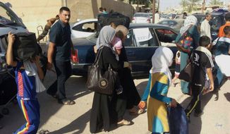More than 140,000 Iraqi civilians have fled Ramadi, the capital of Iraq&#39;s Anbar province, located 70 miles west of Baghdad as Islamic State militants searched door to door for policemen and pro-government fighters and then threw their bodies in the Euphrates River in a bloody purge Monday. (Associated Press)