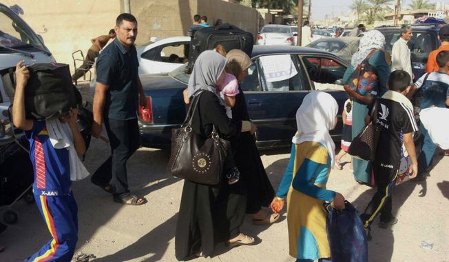 More than 140,000 Iraqi civilians have fled Ramadi, the capital of Iraq&#x27;s Anbar province, located 70 miles west of Baghdad as Islamic State militants searched door to door for policemen and pro-government fighters and then threw their bodies in the Euphrates River in a bloody purge Monday. (Associated Press)