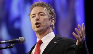 Sen. Rand Paul, Kentucky Republican, said candidates should answer the question about whether, knowing what they know now, they would support the invasion of Iraq, which led to more than 4,000 American troops killed and ongoing turmoil in the region. (Associated Press)