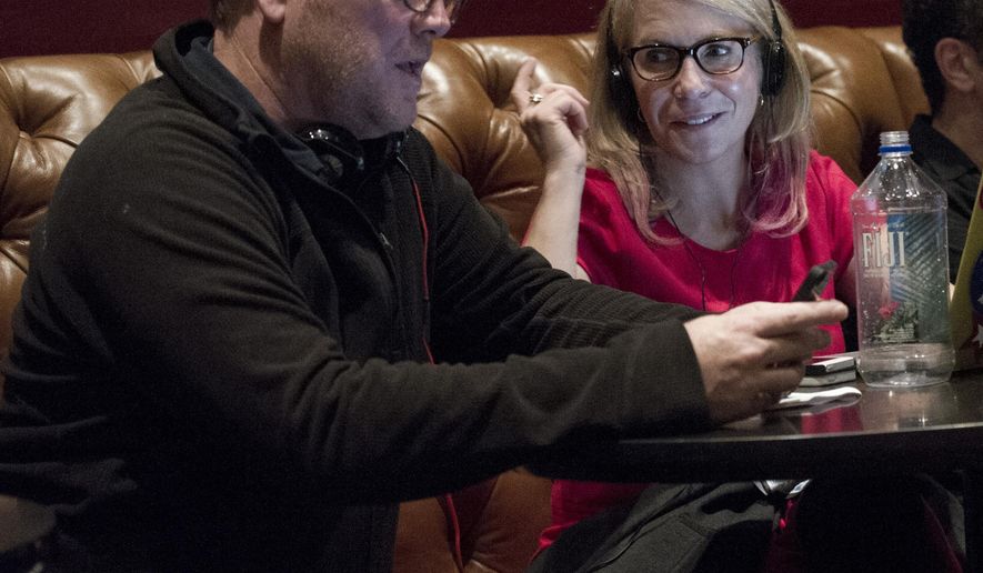 This image released by Bravo shows executive producer Robert Duncan McNeill, left, and Marti Noxon writer-producer of "The Girlfriends Guide to Divorce." Showrunners, formally known as executive producers, generally arise from the ranks of writers. Although women are underrepresented as TV writers _ holding less than a third of cable and broadcast jobs, according to the latest Writers Guild of America study _ the ones who rise to the top can pull other women along. (Carole Segal/Bravo via AP)