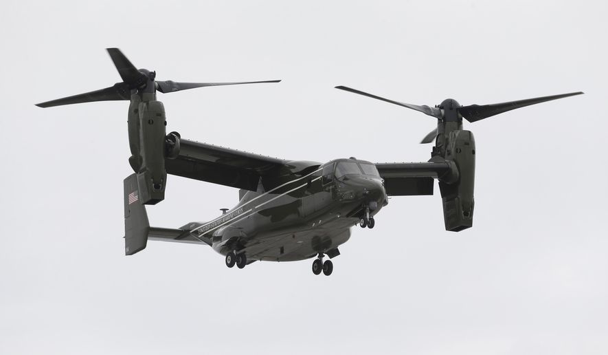 In this April 22, 2015 photo, a Marine Corps MV-22 Osprey comes in for a landing at Miami International Airport before a presidential visit, in Miami. A fatal crash of a U.S. Marine Corps aircraft in Hawaii has renewed safety concerns in Japan, where more of the Ospreys will be deployed. A tilt-rotor MV-22 Osprey caught fire after a hard landing on Sunday, May 17, 2015, killing one Marine and injuring 21 others at Bellows Air Force Station on Hawaii’s main island of Oahu. (AP Photo/Wilfredo Lee)