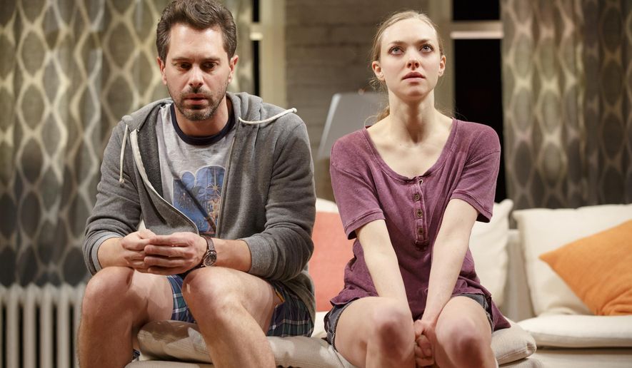 In this image released by Polk PR, Thomas Sadoski, left, and Amanda Seyfried appear during a performance of Neil LaBute’s new play, &amp;quot;The Way We Get By&amp;quot;, in New York. (Joan Marcus/ Polk PR via AP)
