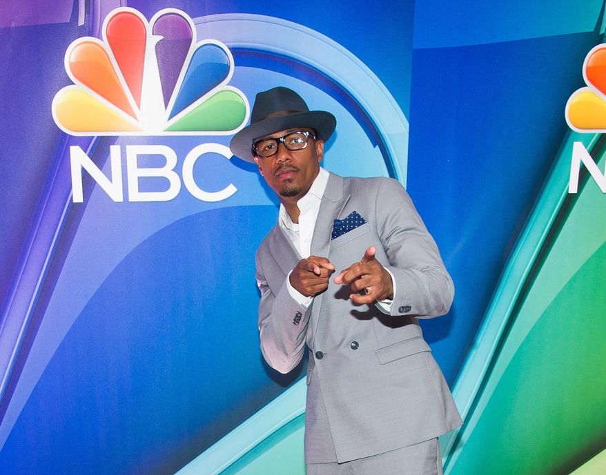 FILE - In this May 11, 2015 file photo, Nick Cannon arrives at the NBC Network 2015 Programming Upfront presentation at Radio City Music Hall in New York. Cannon will attempt to dance nonstop for 24 hours as a warm up to Thursday, May 21, 2015 broadcast of Red Nose Day. (Photo by Charles Sykes/Invision/AP, File)
