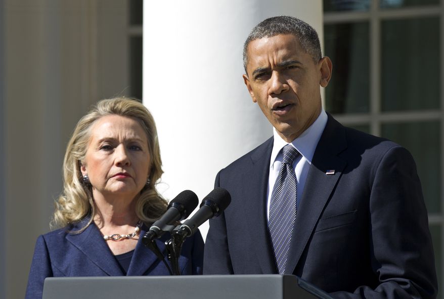 President Barack Obama, accompanied by then-Secretary of State Hillary Rodham Clinton, speaks in the Rose Garden of the White House in Washington, in this Sept. 12, 2012, file photo. (AP Photo/Manuel Balce Ceneta) ** FILE **