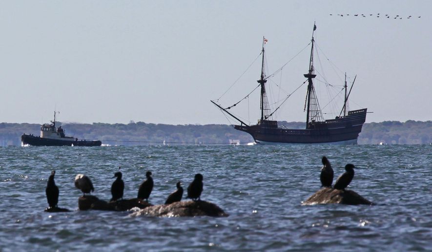 The tugboat Jaguar pulls the Mayflower II, a 1957 replica of the ship that carried the Pilgrims to Massachusetts in 1620, back to her home port in Plymouth, Wednesday, May 20, 2015, a seen from Nyes Cove in Mattapoisett, Mass. The ship had been undergoing renovations at Mystic Seaport in Connecticut since December, part of a multiyear plan. Officials hope to have the ship repaired by 2020 — the 400th anniversary of the original Mayflower crossing of the Atlantic. (Peter Pereira/Standard Times via AP)