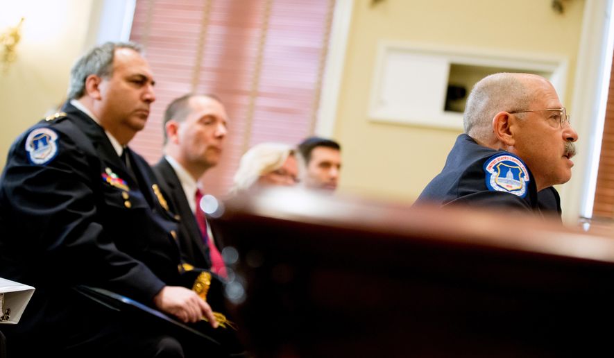 U.S. Capitol Police Chief Kim Dine, right, testifies on Capitol Hill in Washington, Wednesday, May 20, 2015, before a House Administration Committee hearing to discuss safety concerns after a gyrocopter illegally landed on the West Lawn of the U.S. Capitol grounds, securing officers handguns, and other issues. (AP Photo/Andrew Harnik)