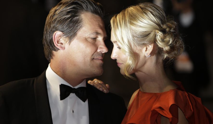 Actor Josh Brolin, left, and his partner Kathryn Boyd leave following the screening of the film Marguerite & Julien at the 68th international film festival, Cannes, southern France, Tuesday, May 19, 2015. (AP Photo/Lionel Cironneau)