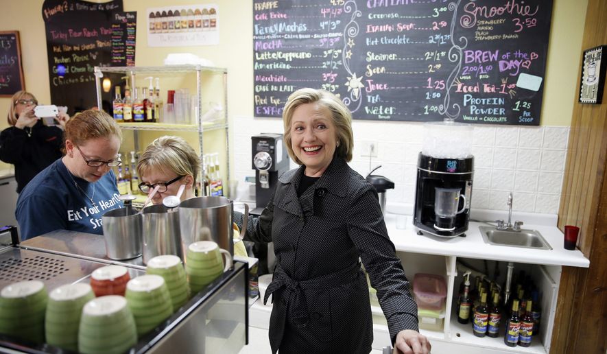 Democratic presidential candidate Hillary Rodham Clinton stops at Em&#39;s Coffee Co., in Independence, Iowa, on May 19, 2015. (Associated Press)