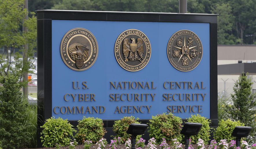FILE In this June 6, 2013 file photo, a sign stands outside the National Security Agency (NSA) campus in Fort Meade, Md. The Justice Department warned lawmakers that the National Security Agency will have to wind down its bulk collection of Americans' phone records by the end of the week if Congress fails to reauthorize the Patriot Act. (AP Photo/Patrick Semansky, File)