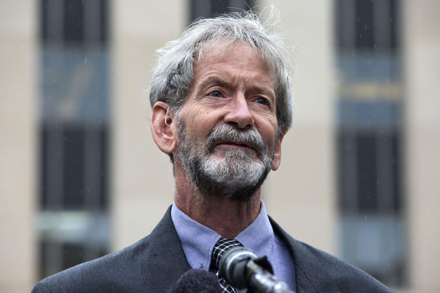Douglas Hughes of Florida speaks to reporters outside federal court in Washington, Thursday, May 21, 2015. Hughes, who flew a gyrocopter through some of America's most restricted airspace before landing at the Capitol pleaded not guilty on Thursday to the six charges he faces. (Associated Press) **FILE**