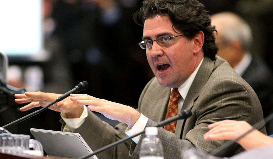 Economic analyst Jeremy Aguero testifies on a new compromise tax plan during a joint money committee hearing at the Legislative Building in Carson City, Nev., on Thursday, May 21, 2015. Lawmakers are considering Gov. Brian Sandoval's latest plan which was projected to raise an additional $542 million over two years. (AP Photo/Cathleen Allison)