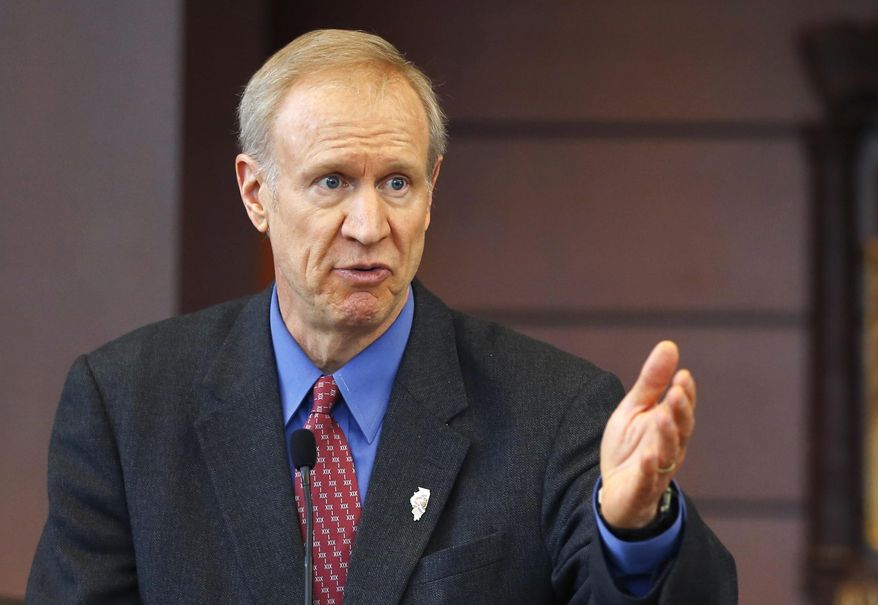 FILE - In this March 20, 2015, file photo, Illinois Gov. Bruce Rauner speaks at a news conference in Chicago. Illinois Democrats in a standoff with Gov. Rauner and other Republicans say they're working to pass a new state budget independently of the GOP, while acknowledging the move comes with political risk.Senate President John Cullerton says the budget is still taking shape and it's unclear when Democrats will present it. Rauner has proposed a $31.5 billion budget that fills a roughly $6 billion revenue gap by slashing spending. The governor has said he's open to finding new revenue if he gets a set of pro-business reforms passed. (AP Photo/Charles Rex Arbogast, File)