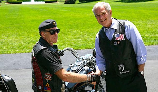 Rolling Thunder founder Artie Muller has brought attention to veterans&#x27; issues for years; here he is greeted at the White House by President George W. Bush in 2008. (white house)