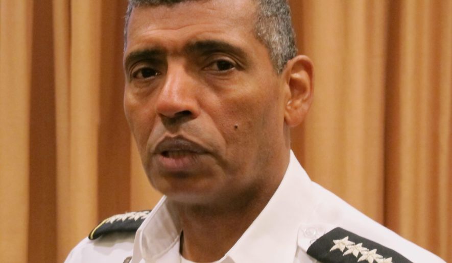 Gen. Vincent Brooks, commander of the U.S. Pacific Command, speaks during an interview in Honolulu on Thursday, May 21, 2015. Brooks said Thursday one of his top priorities is incorporating the growth of U.S. soldiers assigned to the region. (AP Photo/Audrey McAvoy)