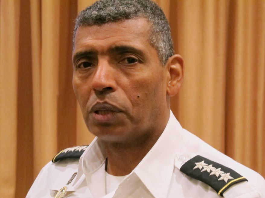 Gen. Vincent Brooks, commander of the U.S. Pacific Command, speaks during an interview in Honolulu on Thursday, May 21, 2015. Brooks said Thursday one of his top priorities is incorporating the growth of U.S. soldiers assigned to the region. (AP Photo/Audrey McAvoy)