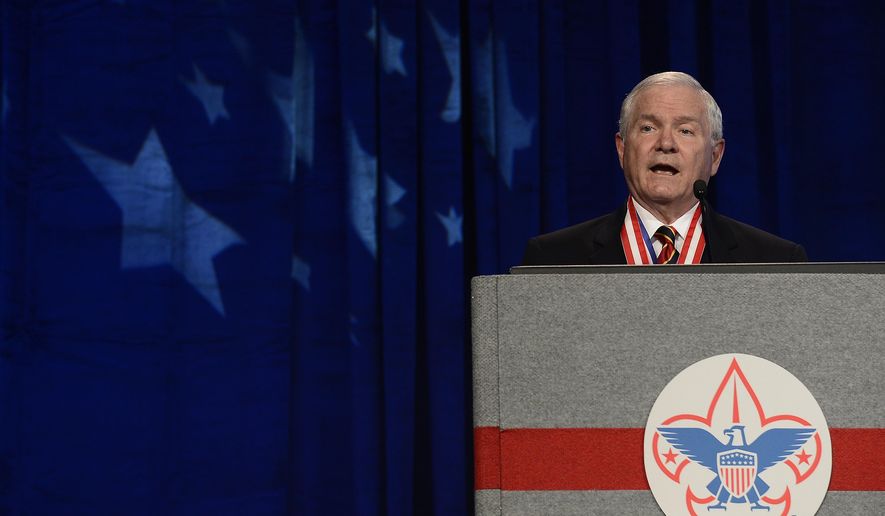 FILE - In this Friday, May 23, 2014 file photo, former Defense Secretary Robert Gates addresses the Boy Scouts of America's annual meeting in Nashville, Tenn., after being selected as the organization's new president. On Thursday Gates said that the organization's longstanding ban on participation by openly gay adults is no longer sustainable, and called for change in order to avert potentially destructive legal battles. (AP Photo/Mark Zaleski, File)