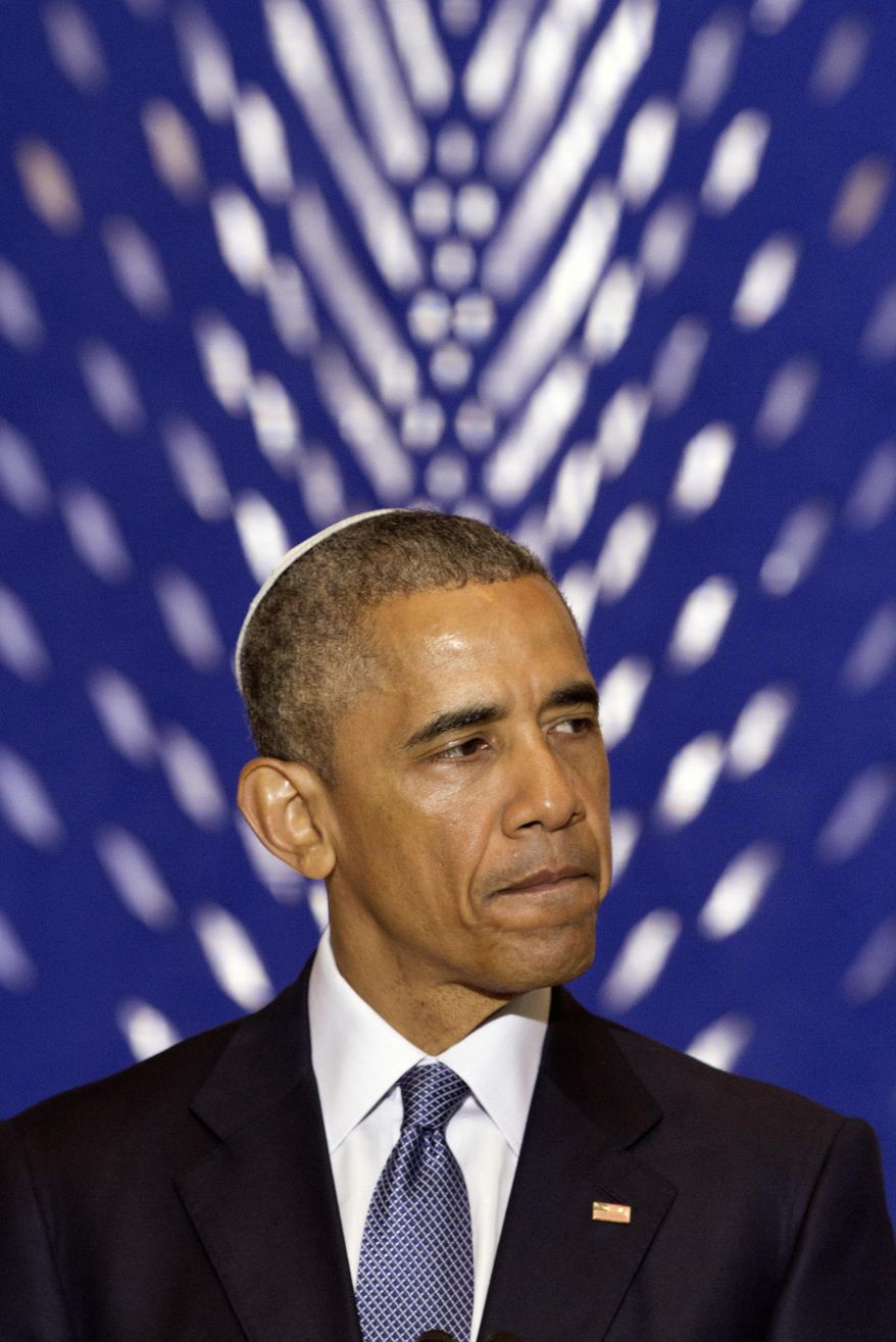 President Barack Obama pauses while speaking at Adas Israel Congregation in Washington, Friday May 22, 2015, as part of Jewish American Heritage Month, The president addressed one of the largest Jewish congregations in Washington to highlight efforts to combat anti-Semitism, a problem he says has created an intimidating environment worldwide for Jewish families. The appearance coincides with Solidarity Shabbat, devoted to showing unity by political leaders in Europe and North America against anti-Semitism. (AP Photo/Jacquelyn Martin)