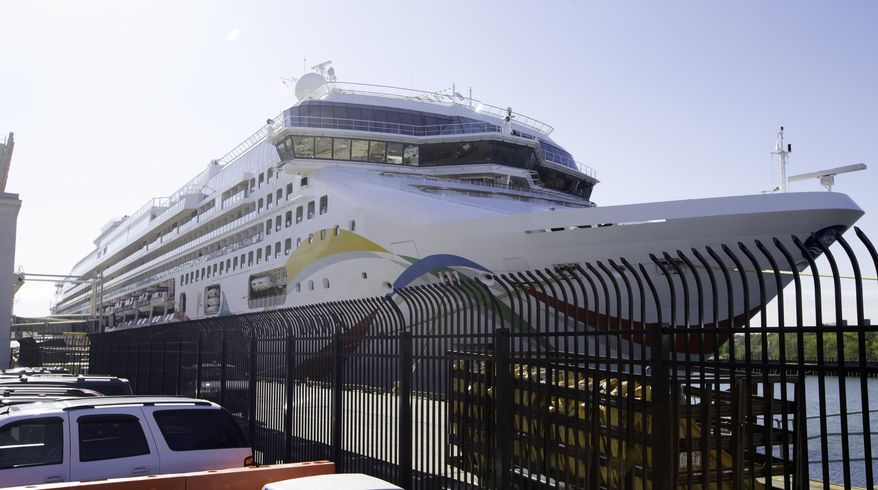 The cruise ship Norwegian Dawn is docked on Friday, May 22, 2015, at the Black Falcon Terminal in Boston. The cruise ship hit the reef late Tuesday and was stuck for more than six hours before a rising tide helped push it into deeper water. Norwegian Cruise Line says a temporary malfunction in the steering system forced the ship off course near Bermuda, where it had spent three days in port. (Mark Garfinkel/The Boston Herald via AP) BOSTON GLOBE OUT; METRO BOSTON OUT; MAGS OUT; ONLINE OUT