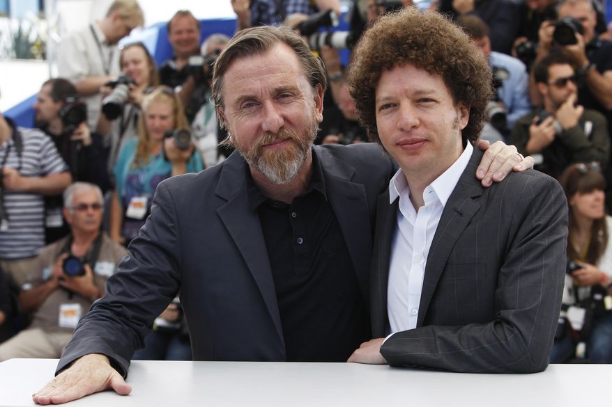 Actor Tim Roth, left, and director Michel Franco pose for photographers during a photo call for the film Chronic, at the 68th international film festival, Cannes, southern France, Friday, May 22, 2015. (AP Photo/Lionel Cironneau)