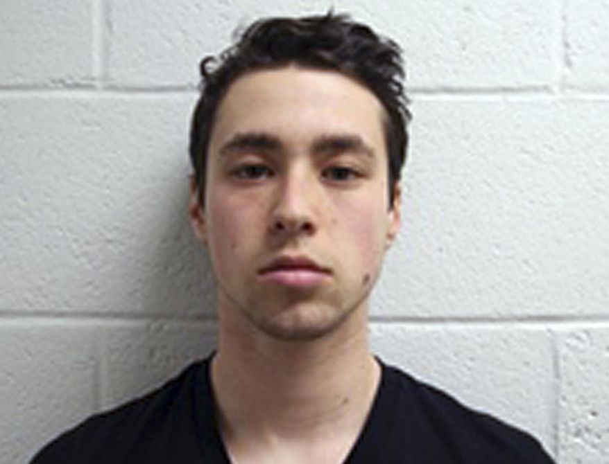 FILE - This Feb. 24, 2015 file booking photo provided by the Middletown Police Department shows Zachary Kramer, 21, of Bethesda, Md., one of four Wesleyan University students arrested on drug charges stemming from on-campus overdoses that sent a dozen people to the hospital the weekend of Feb. 22. Prosecutors announced federal indictments of two of the students, Kramer and Eric Lonergan of Rio de Janeiro, Brazil, on Friday, May 22, 2015. They are charged with distributing controlled substances. (Middletown Police Department via AP, File)