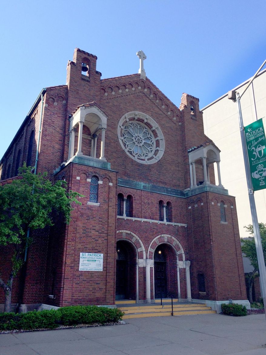 After 89 years, St. Patrick Church in Detroit will hold its last Sunday Mass. Archdiocese spokesman Joe Kohn said that the church could reopen for regular services someday as the neighborhood's popularity grows. Kohn says the parish is down to about 70 families. Mass will be celebrated at 9:30 a.m. Sunday, May 24, 2015. (Patricia Montemurri/Detroit Free Press via AP)