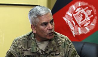 General John F. Campbell, commander of international forces in Afghanistan, speaks during a press conference in Kabul, Afghanistan, Saturday, May 23, 2015. (AP Photo/Allauddin Khan) ** FILE **