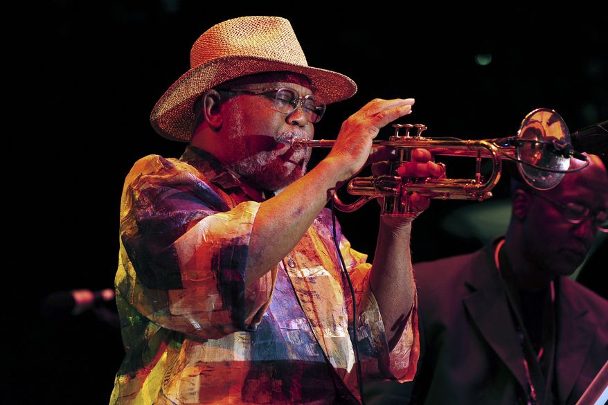 FILE - In this Sept. 2, 2012 file photo, trumpeter Marcus Belgrave performs at the 33rd annual Detroit Jazz Festival, in Detroit. Belgrave, a jazz trumpeter who graced stages and studios with Ray Charles, Aretha Franklin, Dizzy Gillespie, Joe Cocker and Motown artists galore, died Sunday, May 24, 2015. He was 78. (AP Photo/Detroit News, Ricardo Thomas, File) DETROIT FREE PRESS OUT; HUFFINGTON POST OUT; MAGS OUT