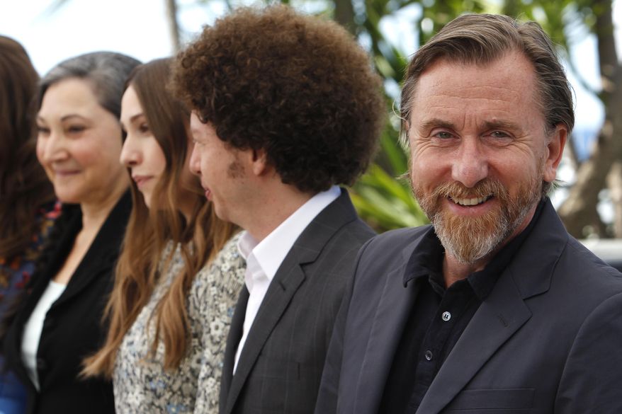 From right, actor Tim Roth, director Michel Franco, Sarah Sutherland and Robin Bartlett pose for photographers during a photo call for the film Chronic, at the 68th international film festival, Cannes, southern France, Friday, May 22, 2015. (AP Photo/Lionel Cironneau)