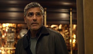 This photo released by Disney shows, George Clooney, as Frank Walker, in a scene from Disney&#39;s &amp;quot;Tomorrowland.&amp;quot; The film releases in U.S. theaters May 22, 2015. (Film Frame/Disney via AP)