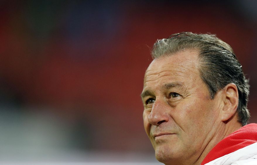 FILE - In this March 13, 2015 file picture Stuttgart's head coach Huub Stevens waits prior to the German first division Bundesliga soccer match between Bayer 04 Leverkusen and VfB Stuttgart in Leverkusen, Germany. Dutch coach Huub Stevens is leaving VfB Stuttgart after returning to save the club from Bundesliga relegation for the second time in as many years. The 61-year-old Stevens was expected to step down after avoiding the drop and Stuttgart says Sunday May 24, 2015 his contract will not be renewed. (AP Photo/Frank Augstein,file